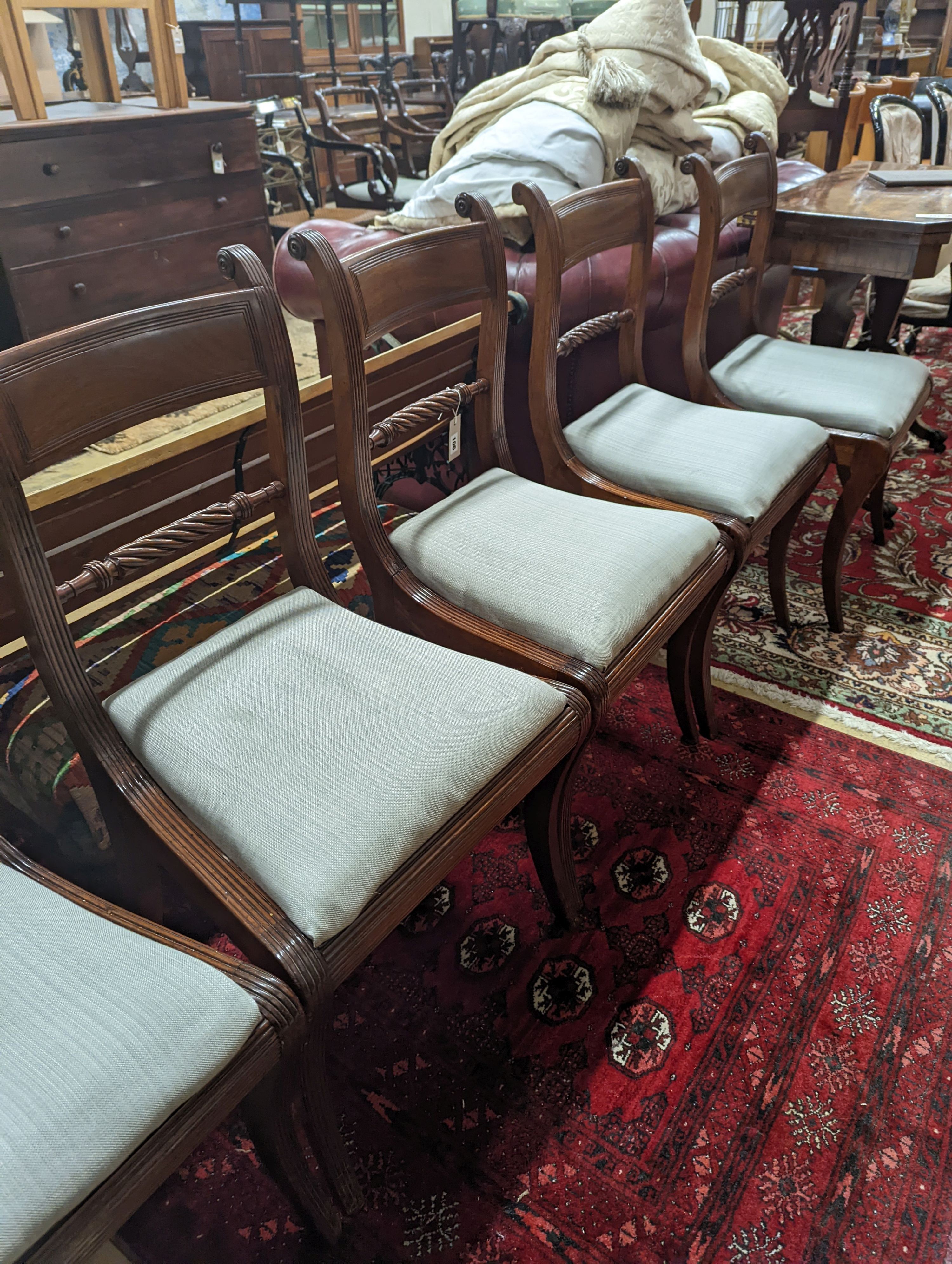 A set of six Regency mahogany dining chairs with rope twist backs